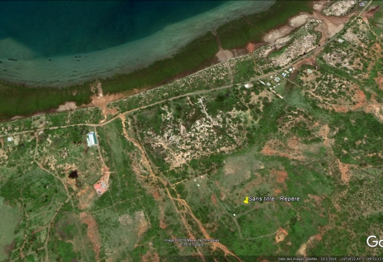 Terrain titré et borné lot N° 26  de 1544 m² avec vue mer imprenable eau et Electricité 